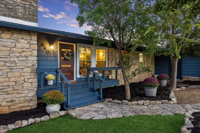 a front view of a house with patio