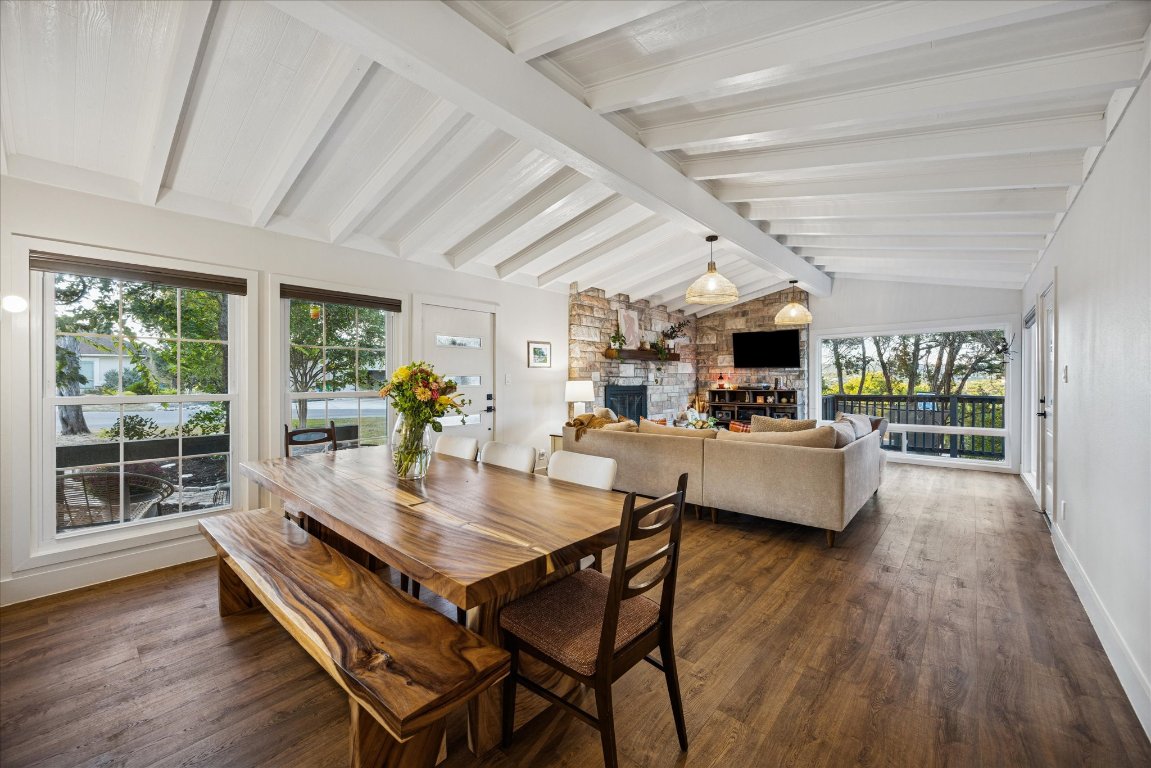 6407 Lynn Lane Lago Vista, TX 78645 - Photo 4 of 32 a dining room with furniture and wooden floor