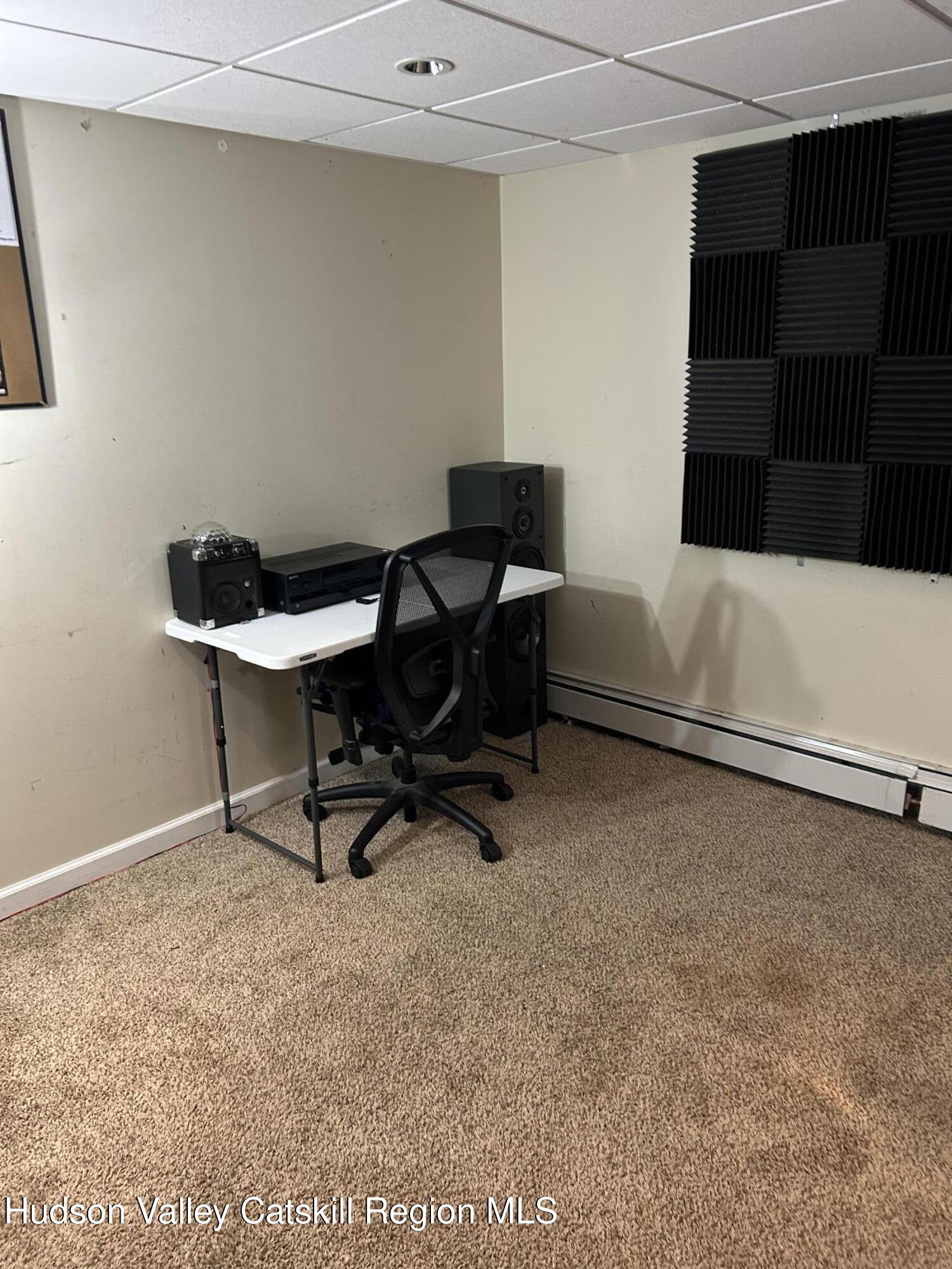 229 Cold Spring Road Hudson, NY 12534 - Photo 10 of 14 a workspace with furniture and a window