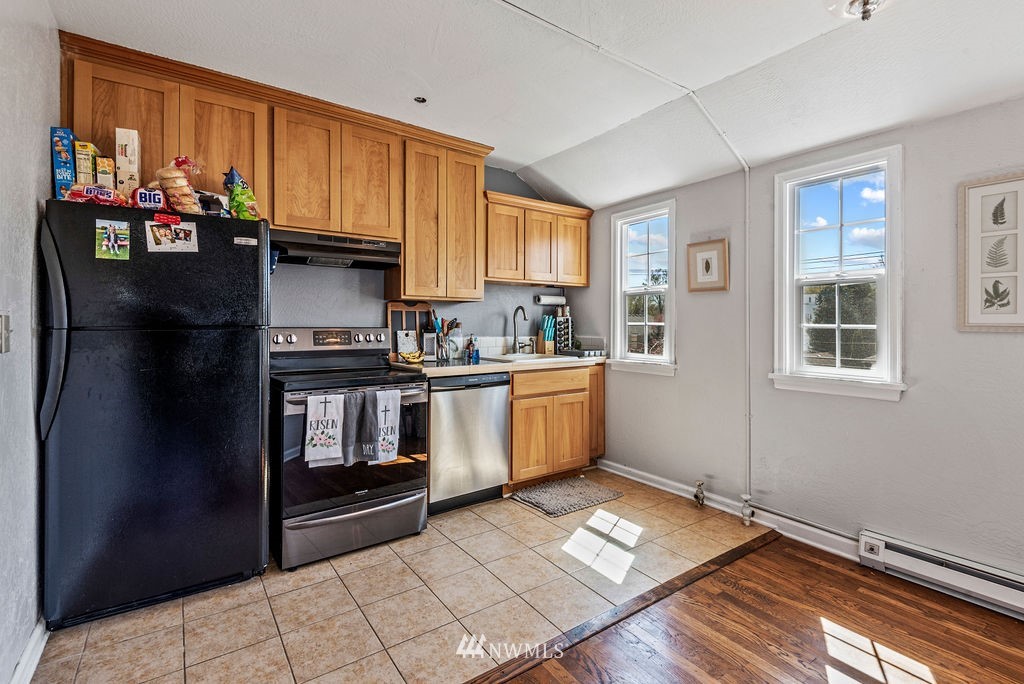 2030 Maple Street, Unit 16 Longview, WA 98632 - Photo 19 of 31 a kitchen with a sink cabinets and window