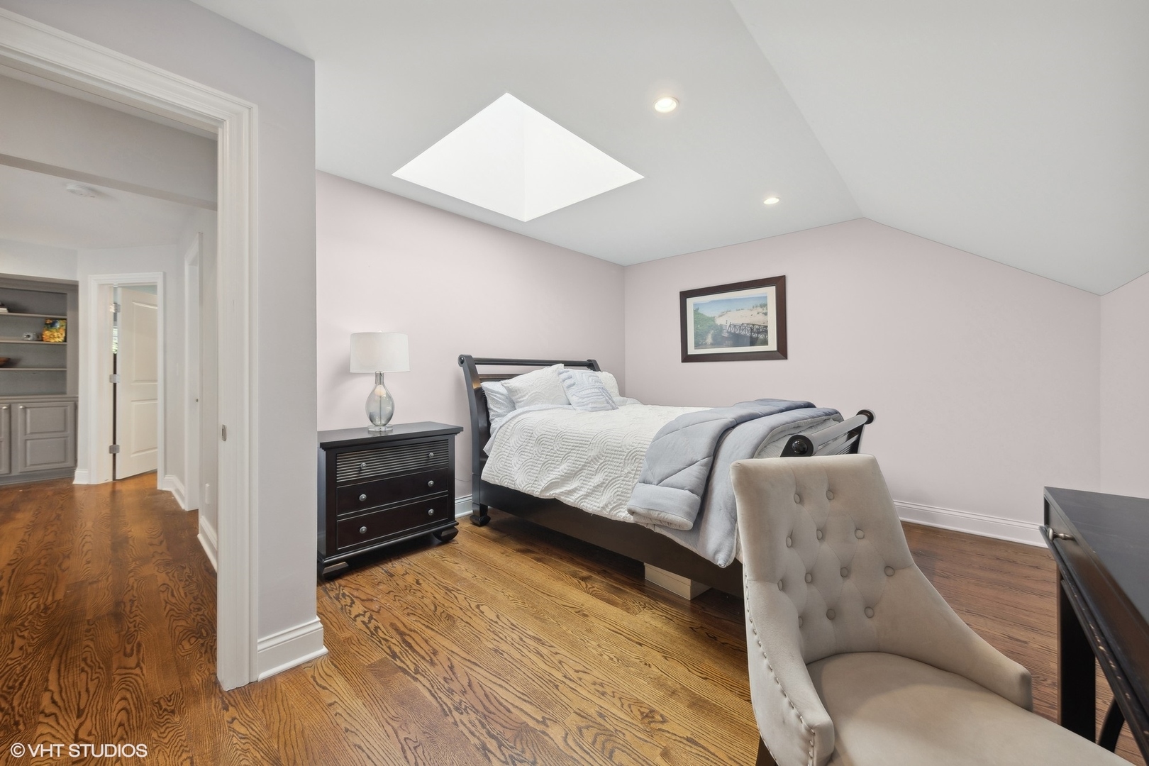 6 Bel Aire Court Burr Ridge, IL 60527 - Photo 21 of 37 a bedroom with a bed and a couch