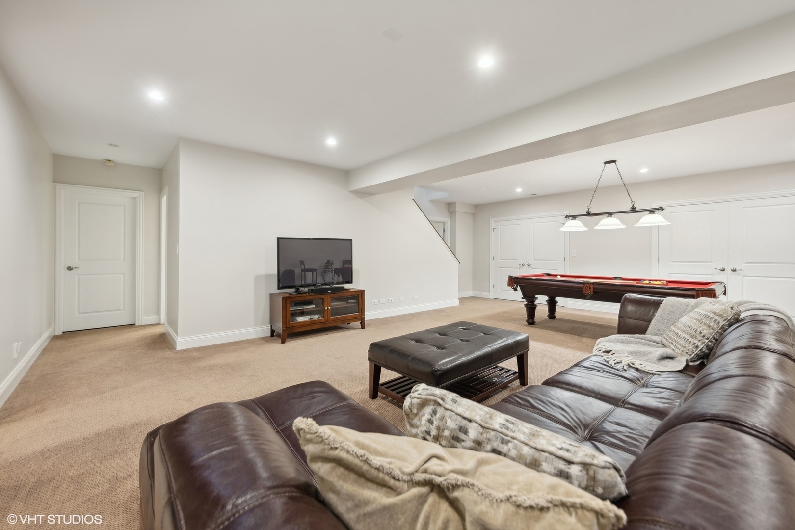6 Bel Aire Court Burr Ridge, IL 60527 - Photo 25 of 37 a living room with furniture and a flat screen tv