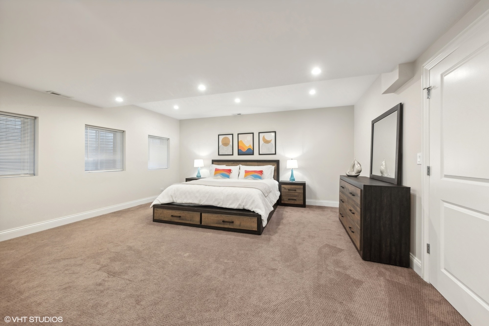 6 Bel Aire Court Burr Ridge, IL 60527 - Photo 26 of 37 a spacious bedroom with a bed and cabinet
