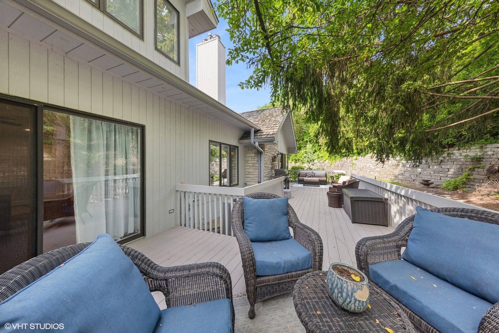 6 Bel Aire Court Burr Ridge, IL 60527 - Photo 30 of 37 a view of a patio with couches table and chairs and potted plants