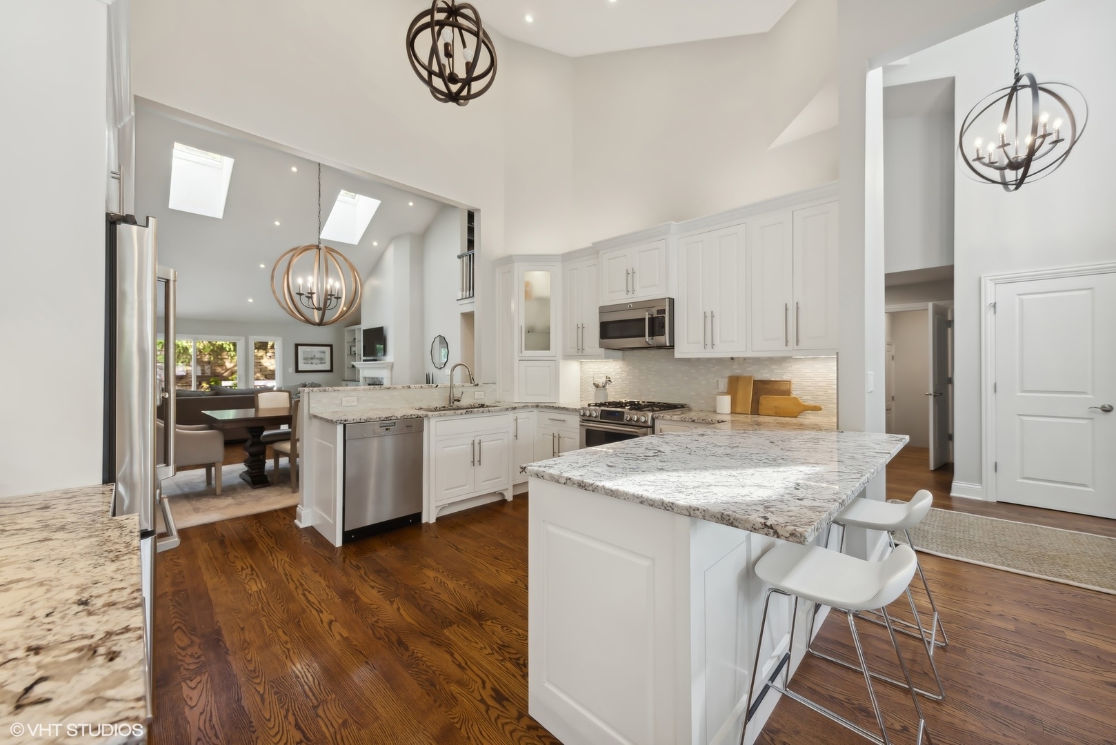 6 Bel Aire Court Burr Ridge, IL 60527 - Photo 6 of 37 a kitchen with a sink cabinets and wooden floor