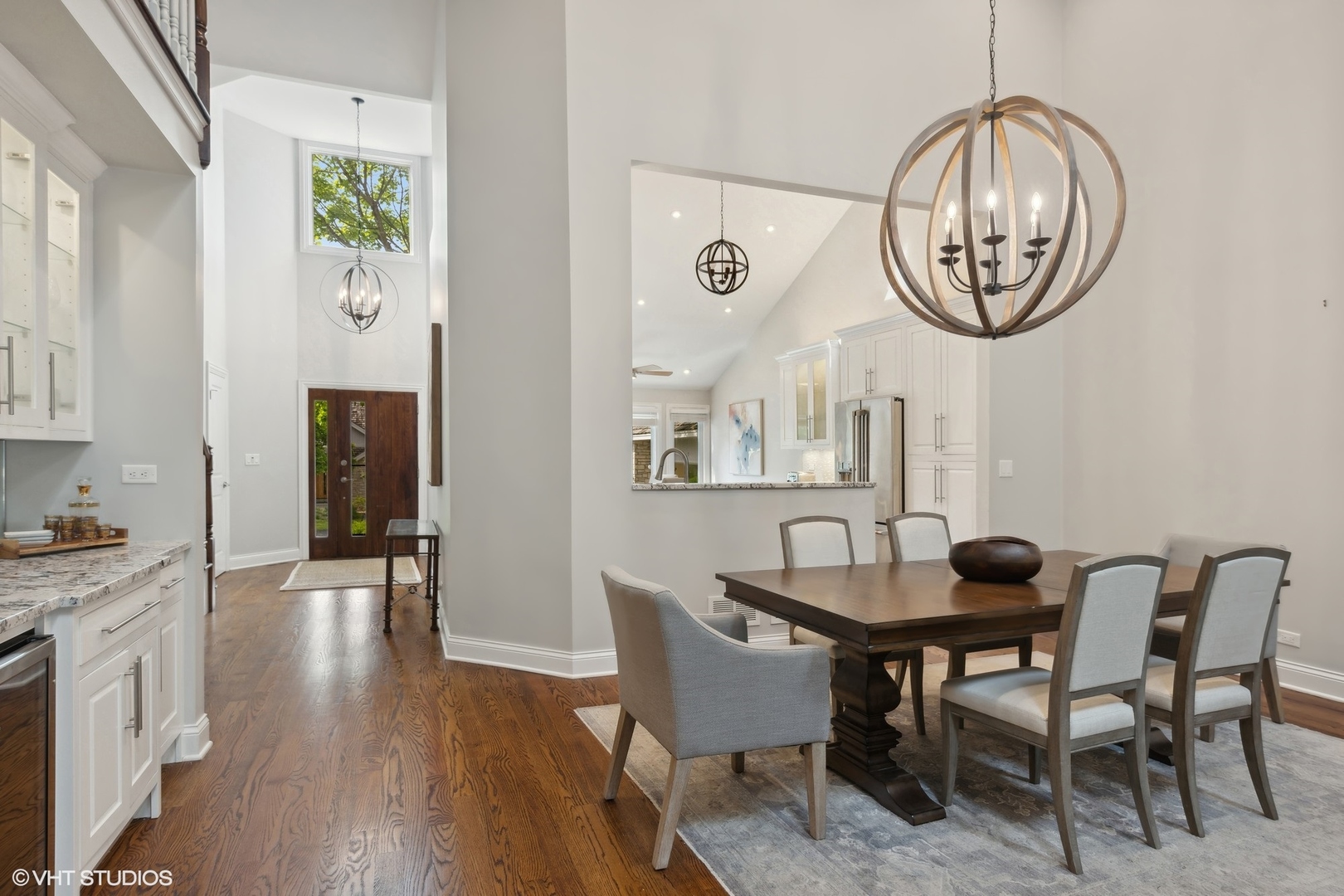 6 Bel Aire Court Burr Ridge, IL 60527 - Photo 10 of 37 a view of a dining room with furniture window and wooden floor