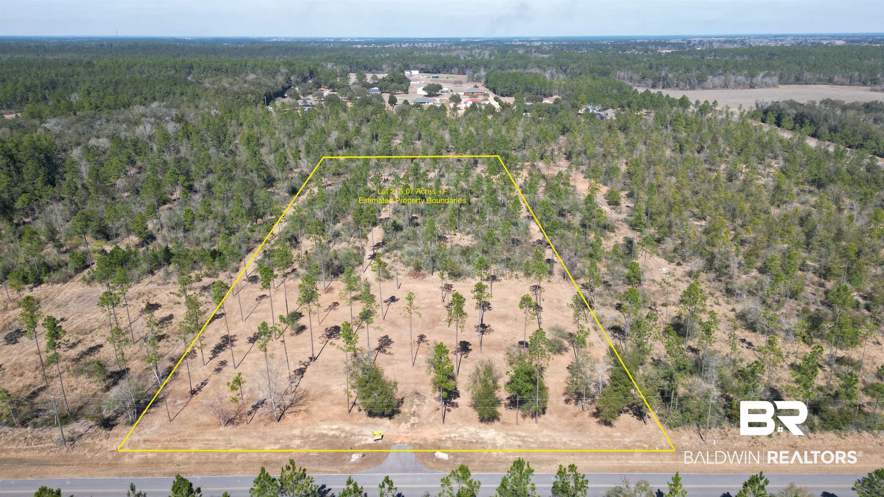 0 Archie Road Elberta, AL 36530 - Photo 2 of 16 Aerial view of sparsely populated area with property boundaries highlighted and a forest
