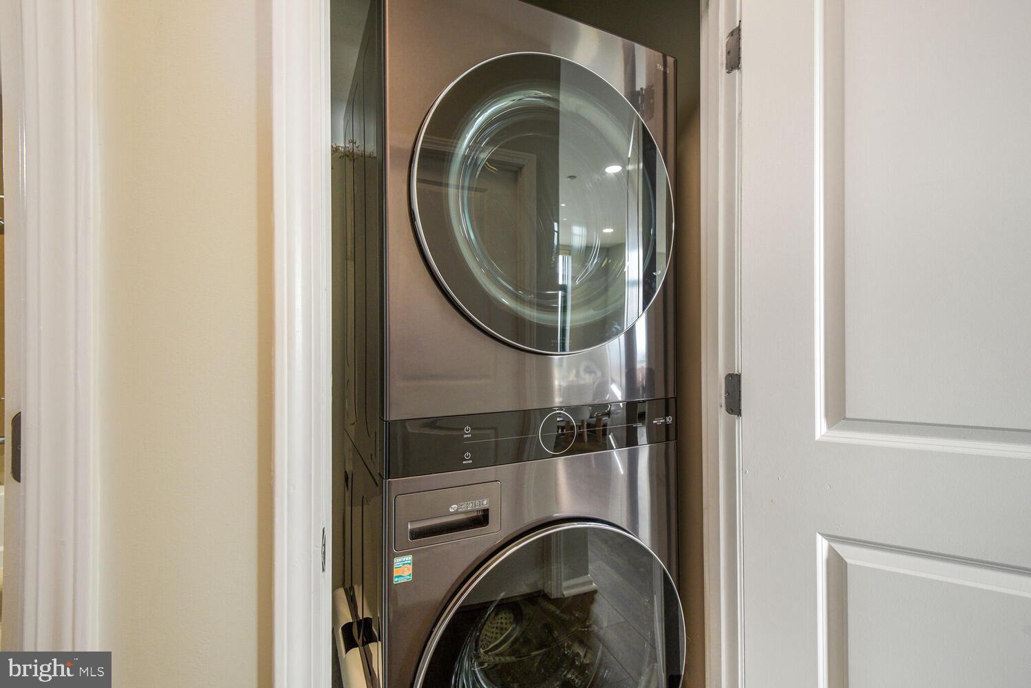 11700 Old Georgetown Road, Unit 1604 North Bethesda, MD 20852 - Photo 17 of 41 a close view of utility room with washer and dryer