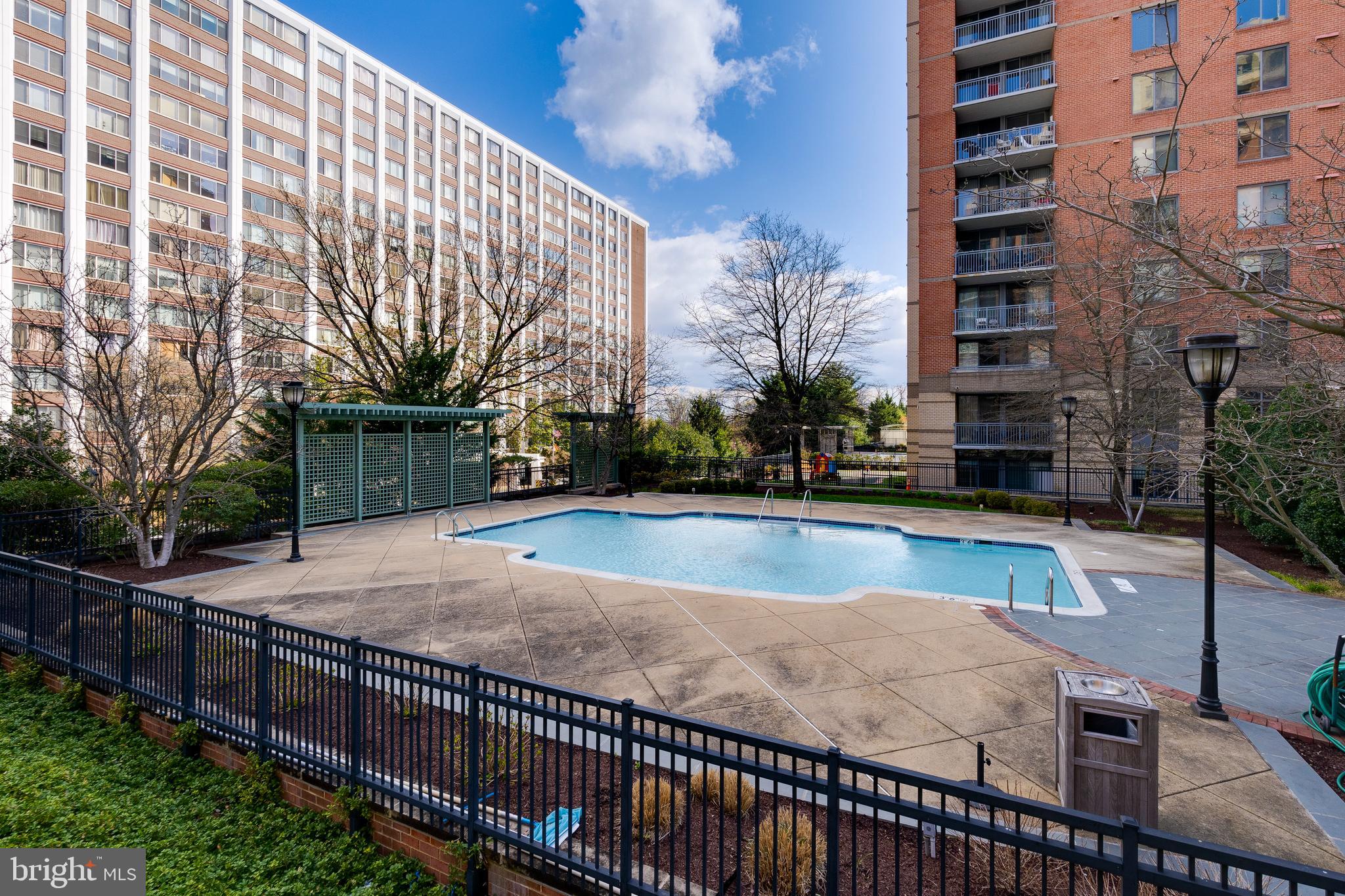 11700 Old Georgetown Road, Unit 1604 North Bethesda, MD 20852 - Photo 30 of 41 a view of a swimming pool with a patio