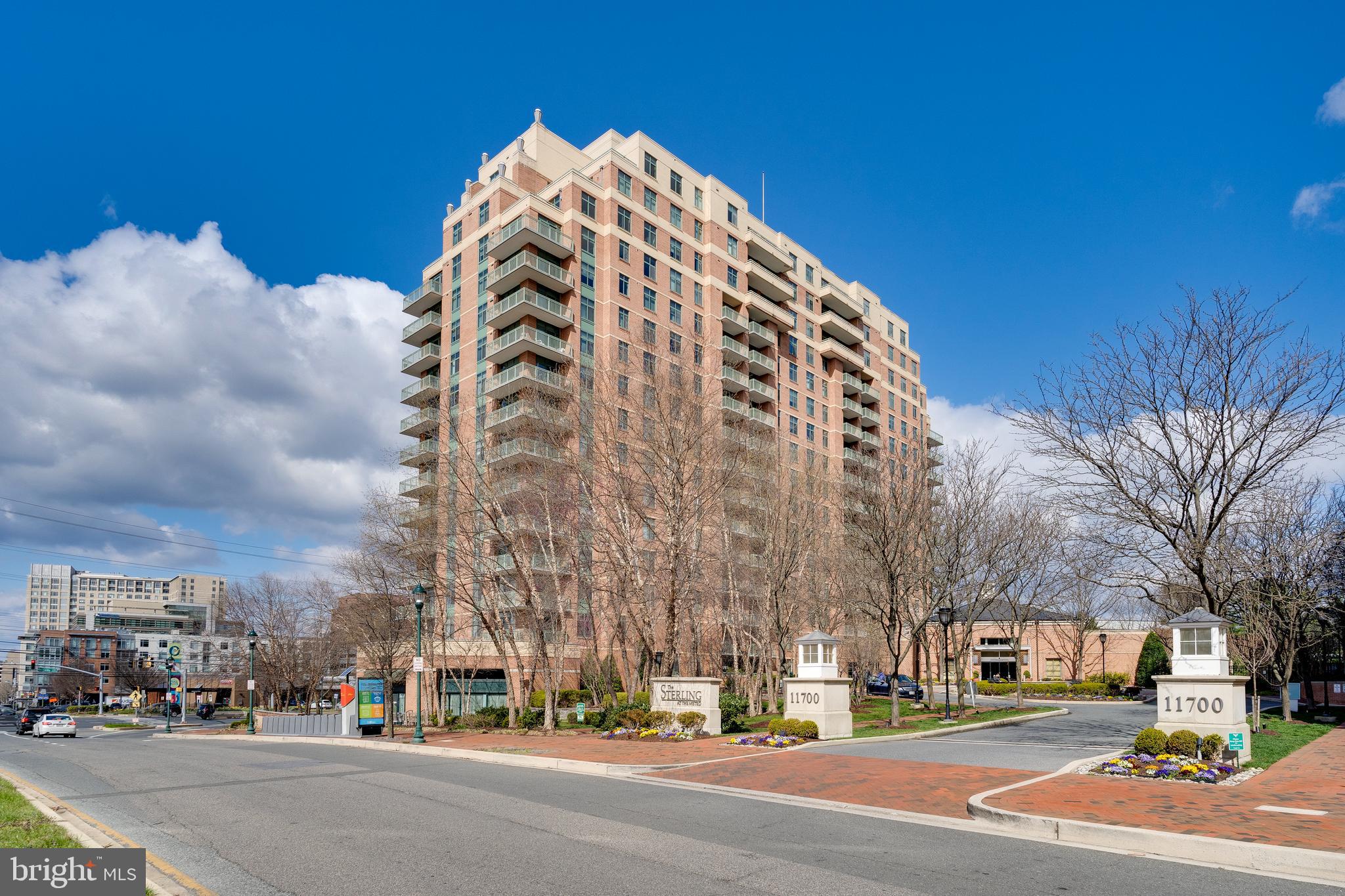 11700 Old Georgetown Road, Unit 1604 North Bethesda, MD 20852 - Photo 32 of 41 a view of a tall building next to a road