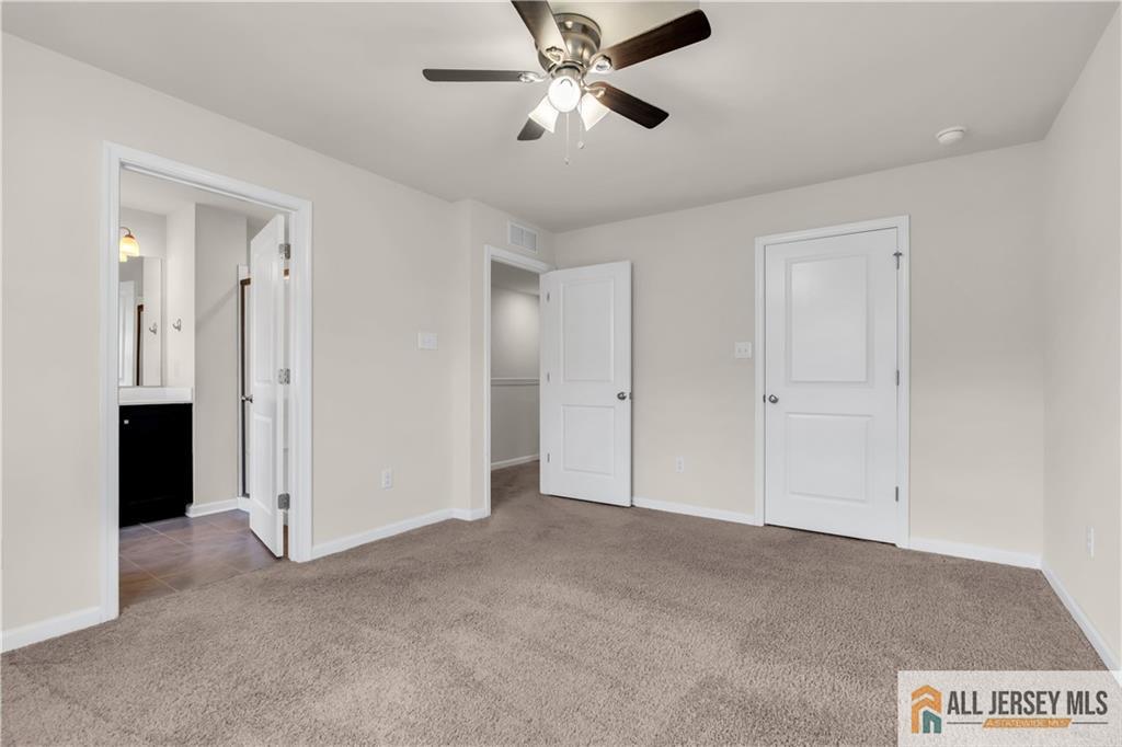 504 East International Road, Unit 504 Monroe Township, NJ 08831 - Photo 15 of 29 a view of an empty room