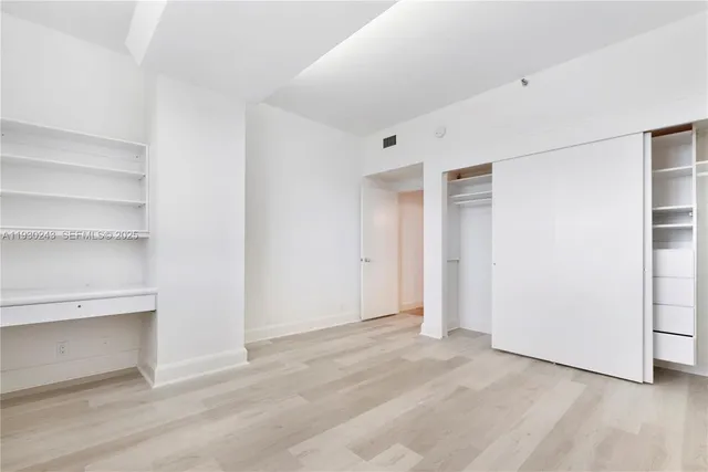 a view of an empty room with empty racks