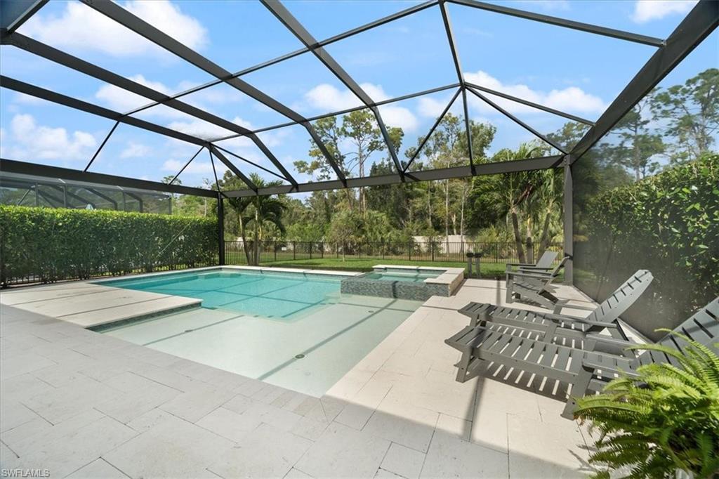 3524 Pilot Circle Naples, FL 34120 - Photo 28 of 30 a view of backyard with swimming pool