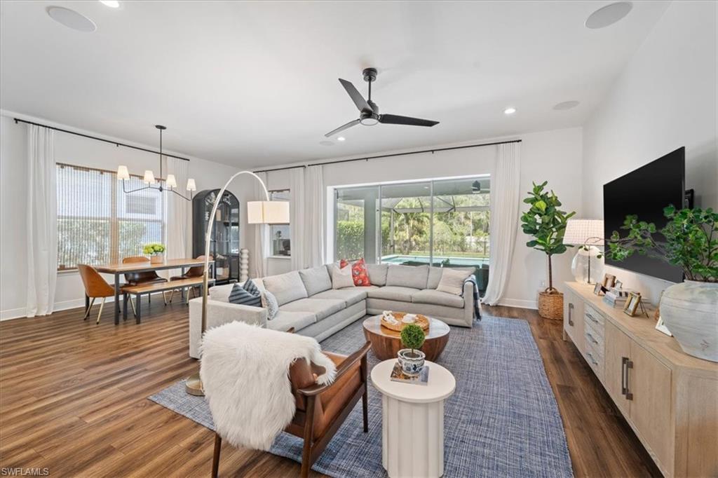 3524 Pilot Circle Naples, FL 34120 - Photo 5 of 30 a living room with furniture and a flat screen tv