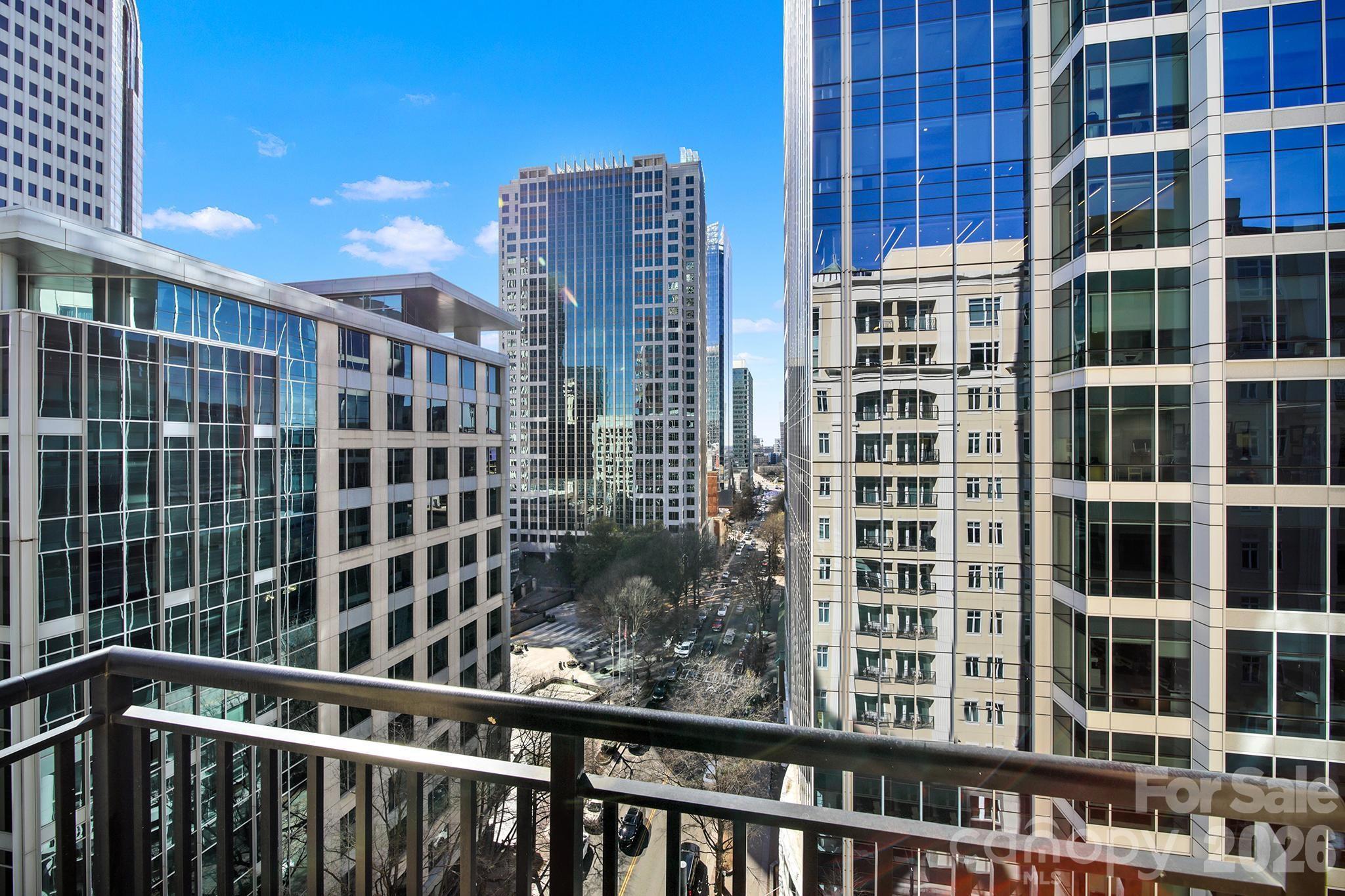 230 South Tryon Street, Unit 1004 Charlotte, NC 28281 - Photo 25 of 39 a view of a building from a balcony