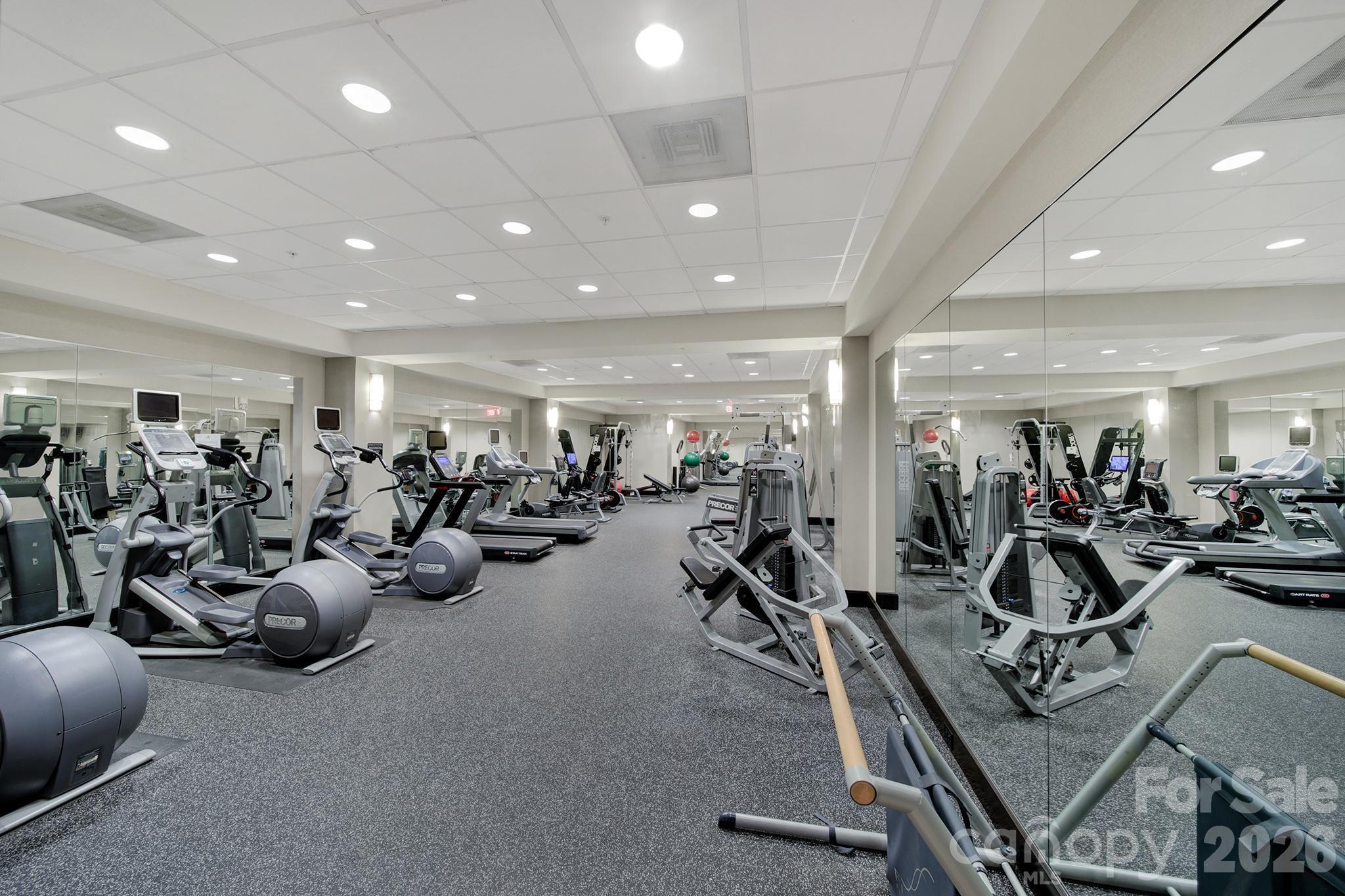230 South Tryon Street, Unit 1004 Charlotte, NC 28281 - Photo 35 of 39 a view of a room with gym equipment