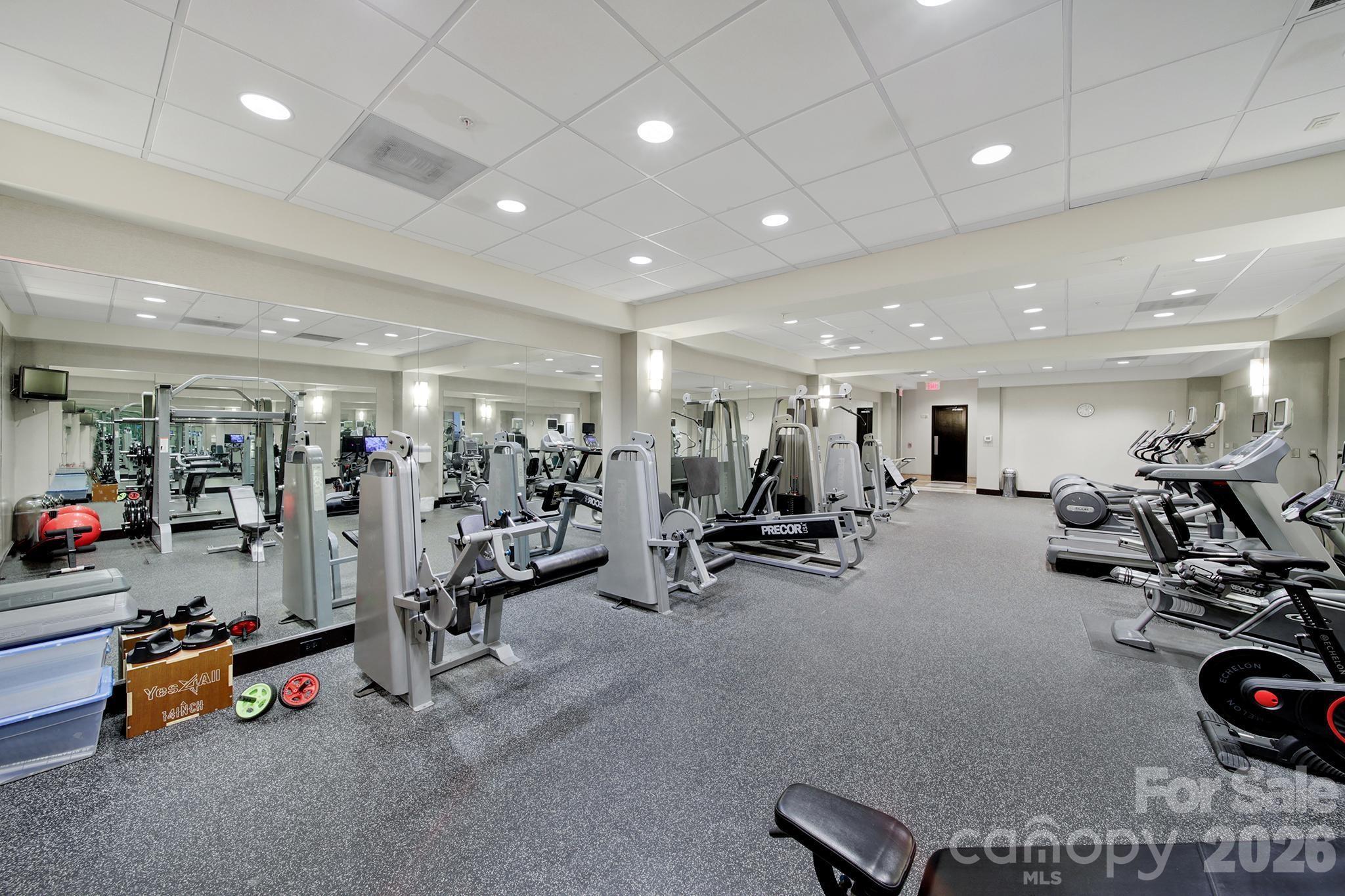 230 South Tryon Street, Unit 1004 Charlotte, NC 28281 - Photo 36 of 39 a view of a room with gym equipment
