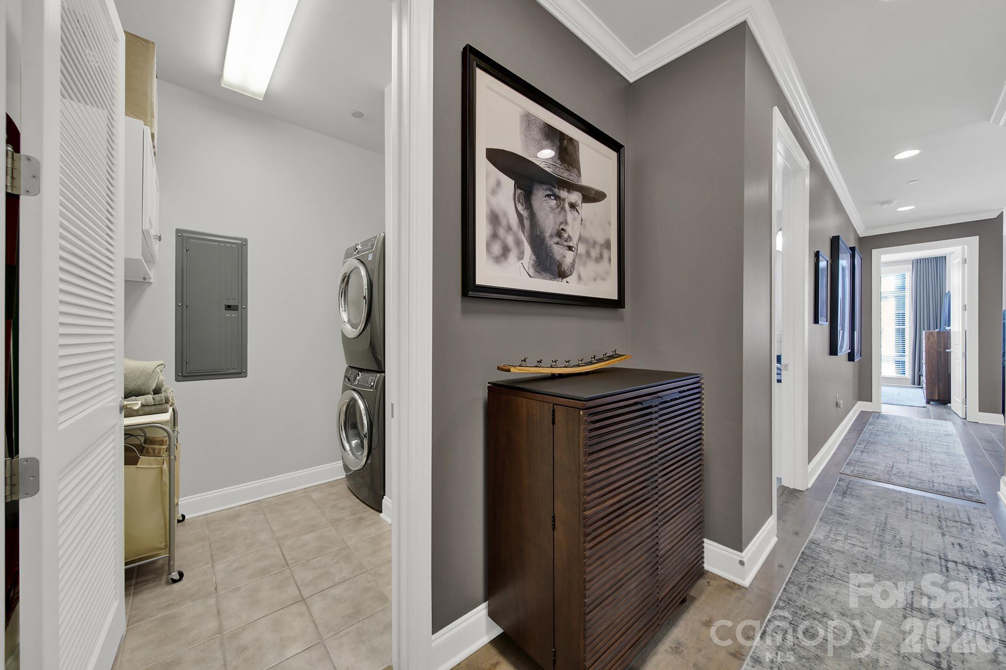 230 South Tryon Street, Unit 1004 Charlotte, NC 28281 - Photo 4 of 39 a view of hallway with livingroom and furniture