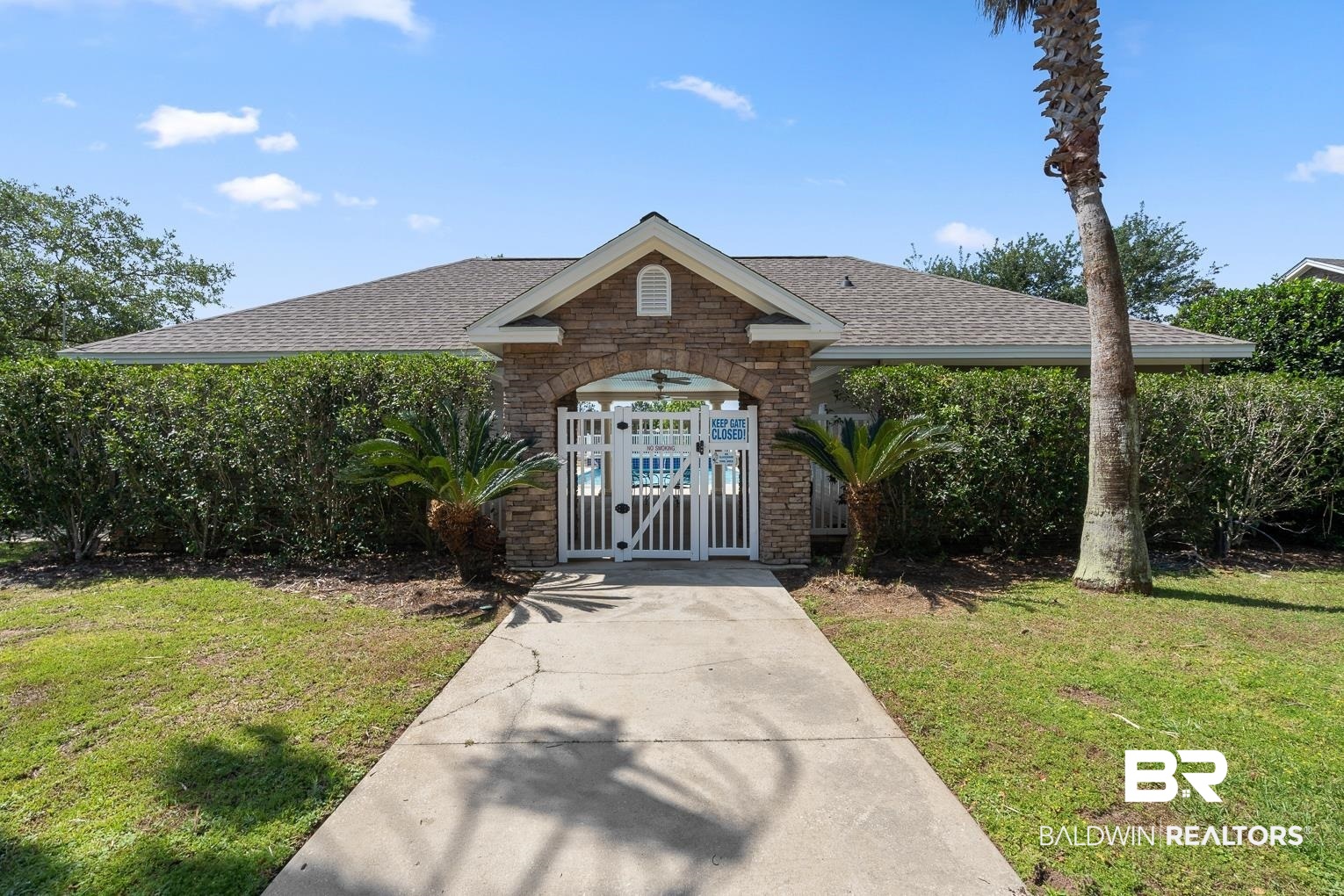 450 Park Avenue, Unit 112 Foley, AL 36535 - Photo 16 of 20 Entry Gate to Pool Area