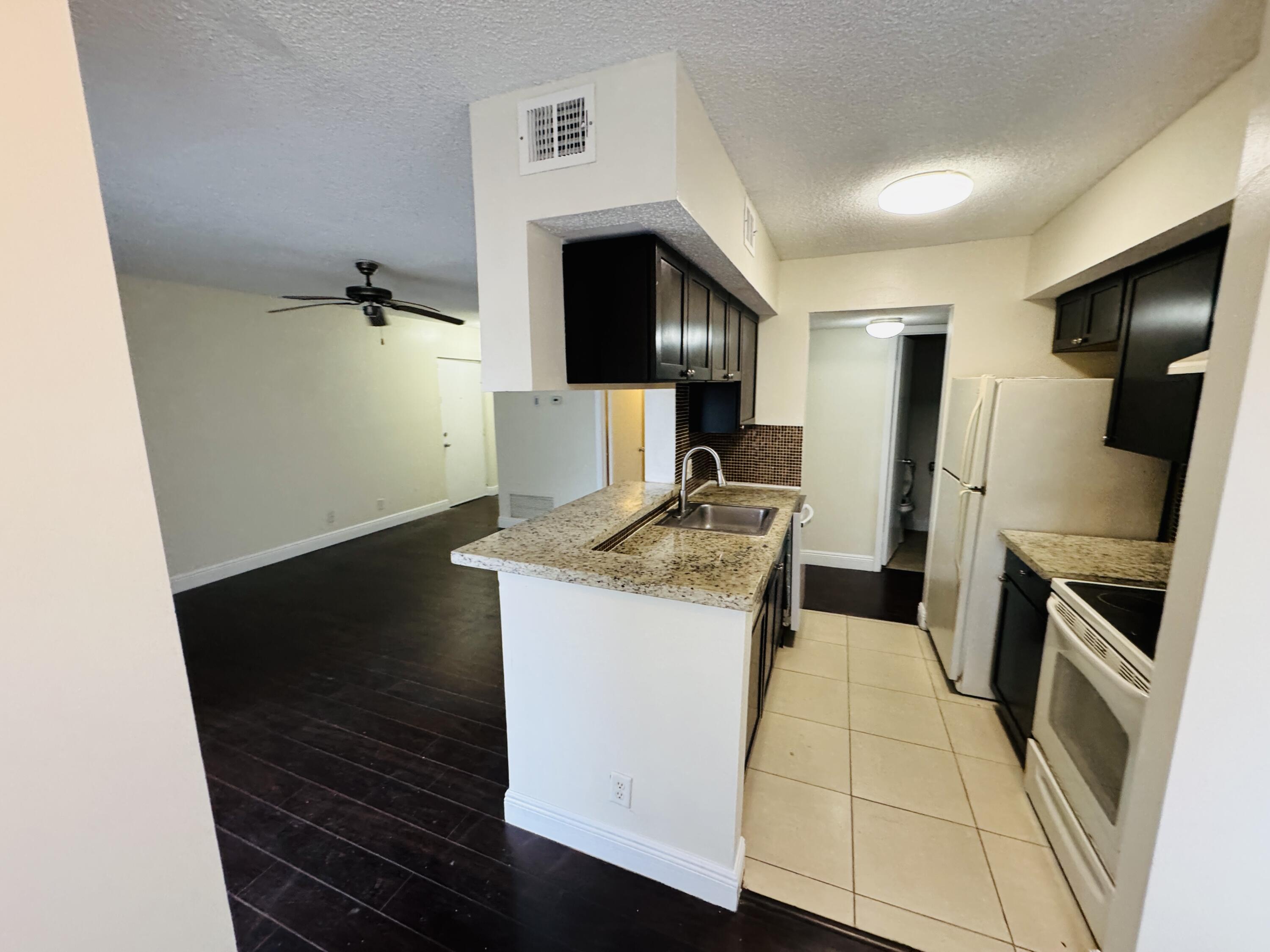 5686 Rock Island Road, Unit 115 Tamarac, FL 33319 - Photo 2 of 19 Photo Mar 04 2025, 4 30 17 PM