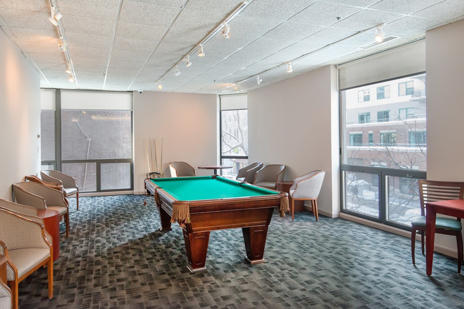 70 West Huron Street, Unit 705 Chicago, IL 60654 - Photo 15 of 16 a room with furniture and a window