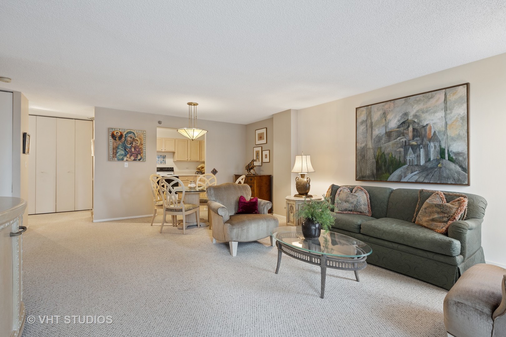 70 West Huron Street, Unit 705 Chicago, IL 60654 - Photo 4 of 16 a living room with furniture and a couch