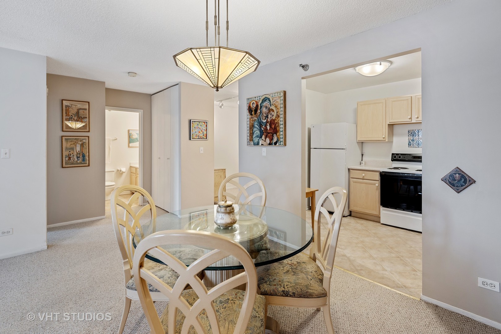 70 West Huron Street, Unit 705 Chicago, IL 60654 - Photo 5 of 16 a view of a dining room with furniture