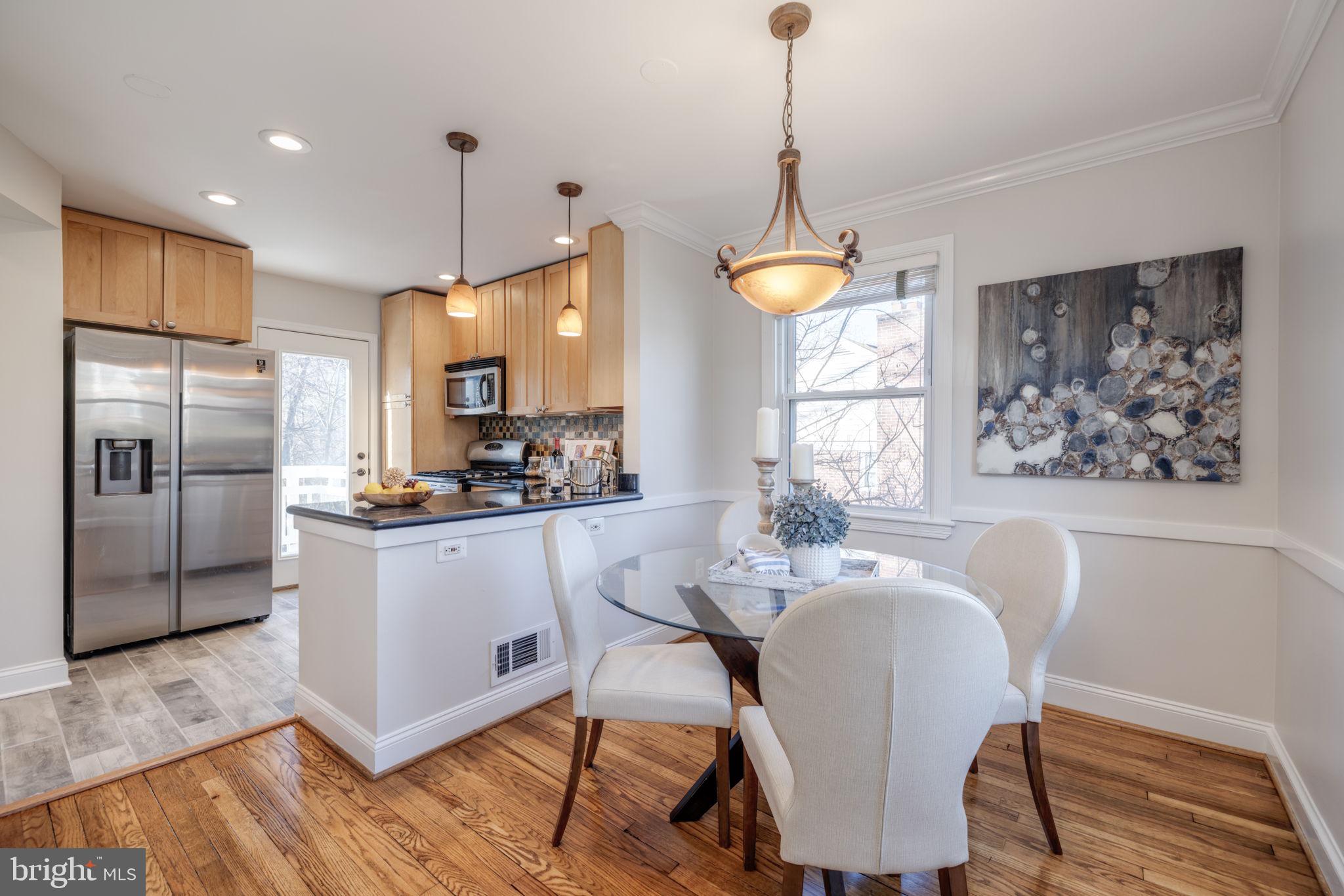 10120 Tenbrook Drive Silver Spring, MD 20901 - Photo 7 of 32 Dining area open to kitchen