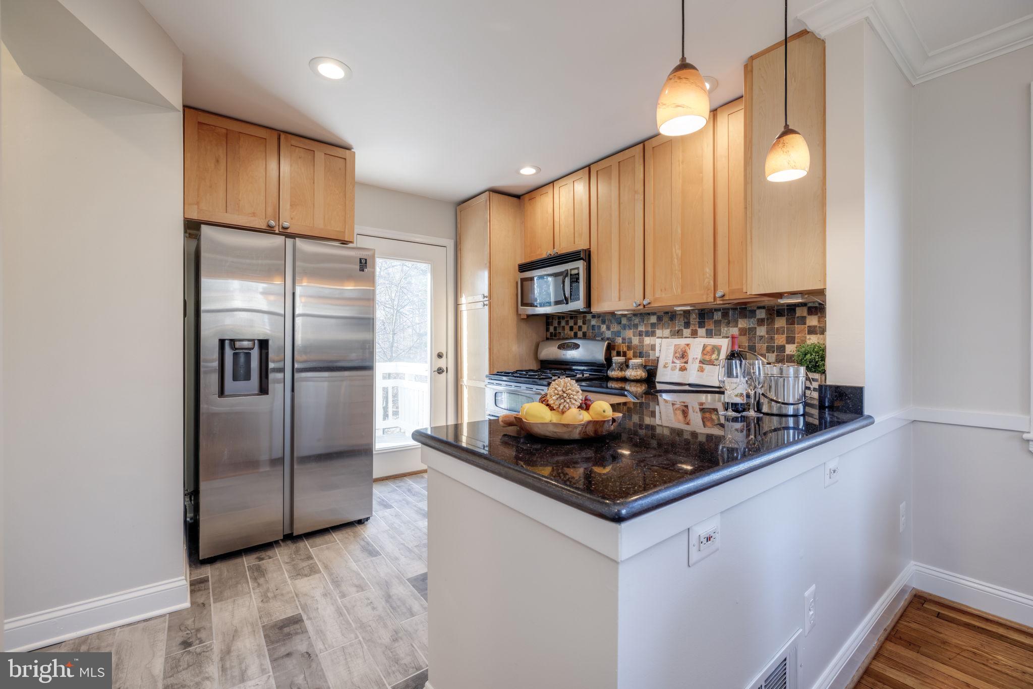 10120 Tenbrook Drive Silver Spring, MD 20901 - Photo 8 of 32 Sunny tiled kitchen