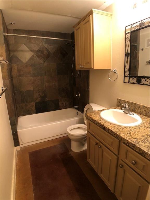 2106 Cullen Avenue, Unit 111 Austin, TX 78757 - Photo 4 of 6 Full bathroom featuring shower / bathtub combination and vanity
