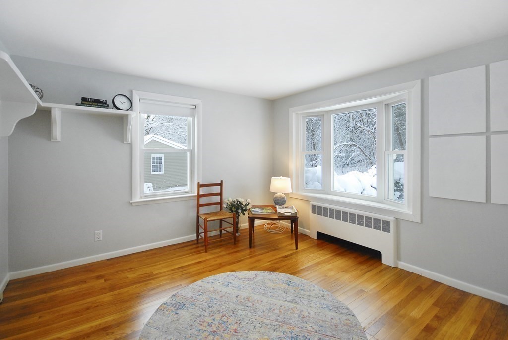 82 Powers Road Concord, MA 01742 - Photo 12 of 35 a view of a livingroom with furniture and windows