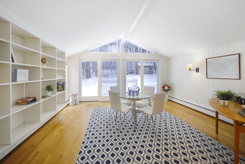82 Powers Road Concord, MA 01742 - Photo 2 of 35 a living room with a couch and a table