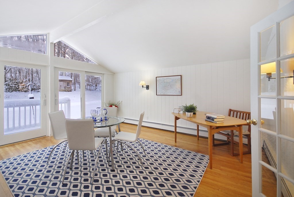 82 Powers Road Concord, MA 01742 - Photo 28 of 35 a living room with furniture and a table