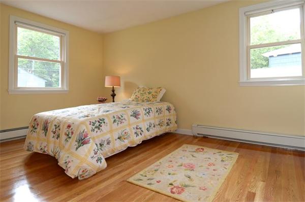 50 Gilbert Road Needham, MA 02492 - Photo 14 of 25 a bedroom with a bed and a window