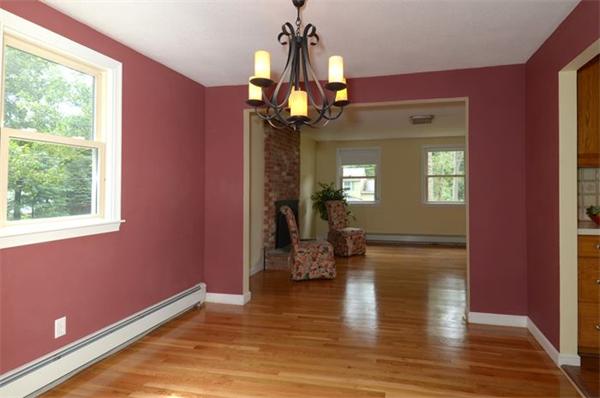 50 Gilbert Road Needham, MA 02492 - Photo 17 of 25 a view of a livingroom with wooden floor and windows