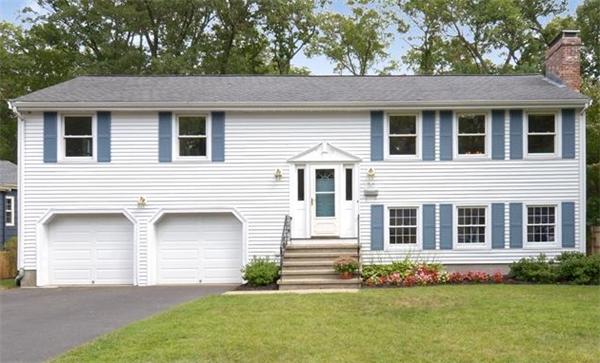 50 Gilbert Road Needham, MA 02492 - Photo 25 of 25 a front view of a house with a garden