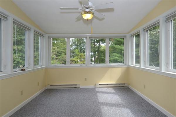 50 Gilbert Road Needham, MA 02492 - Photo 9 of 25 an empty room with windows and fan