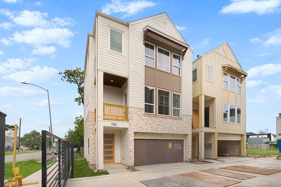 1106 Weiss Street Houston, TX 77009 - Photo 1 of 13 a view of a white building among the street