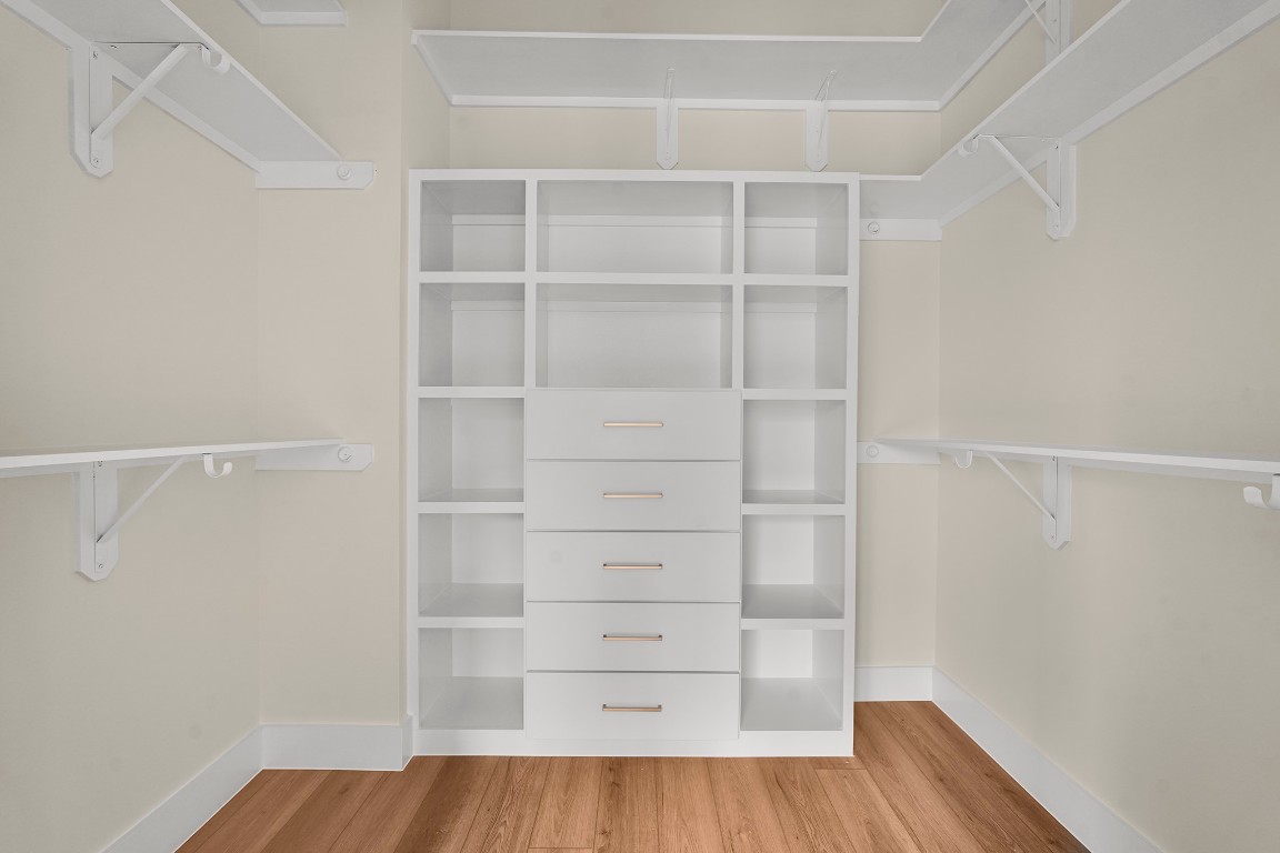 1106 Weiss Street Houston, TX 77009 - Photo 11 of 13 a view of walk in closet with empty racks