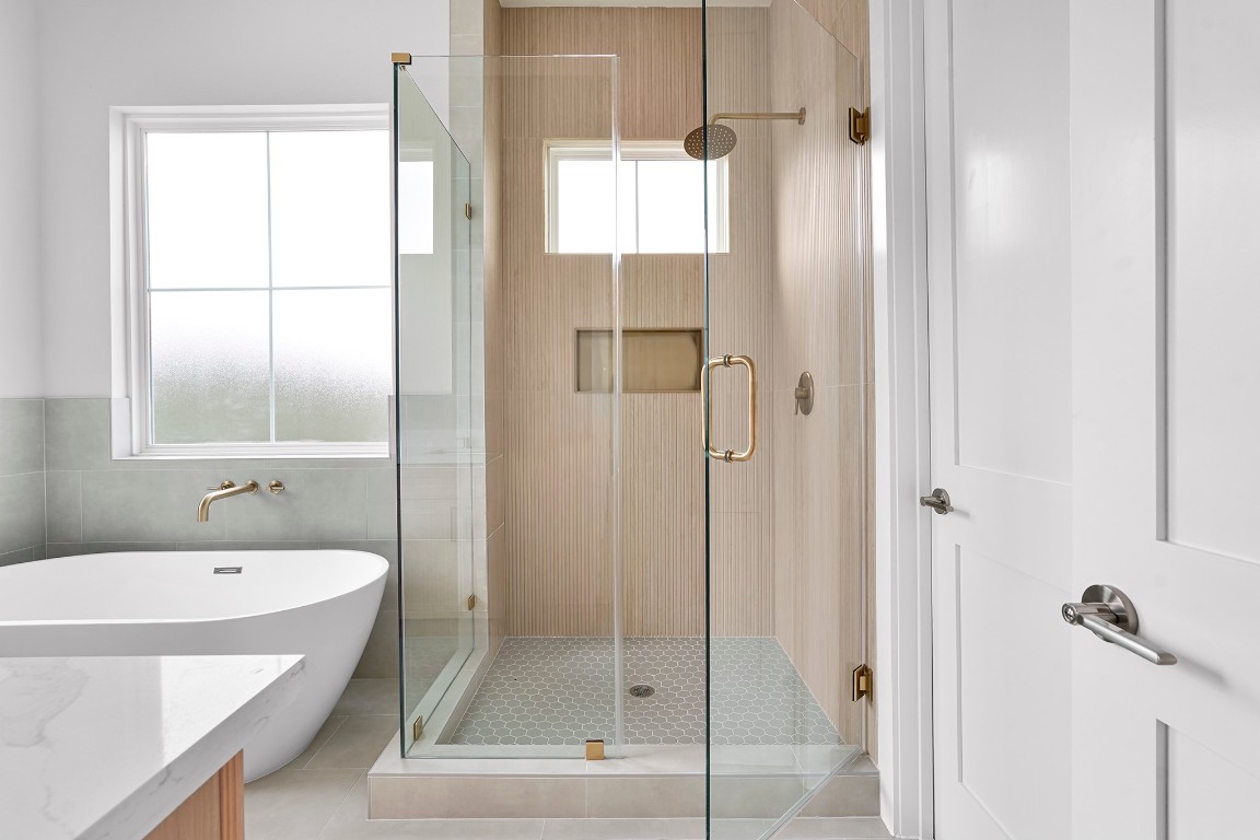 1106 Weiss Street Houston, TX 77009 - Photo 9 of 13 a bathroom with a tub and shower