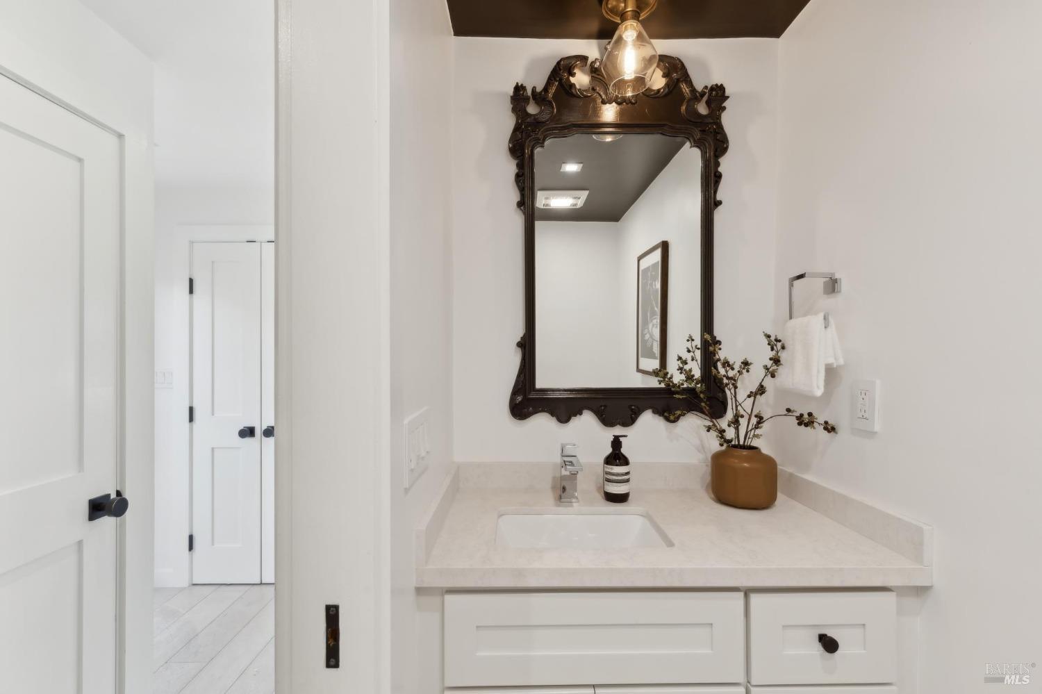 31 Mohawk Avenue Corte Madera, CA 94925 - Photo 31 of 57 a bathroom with a sink and a mirror
