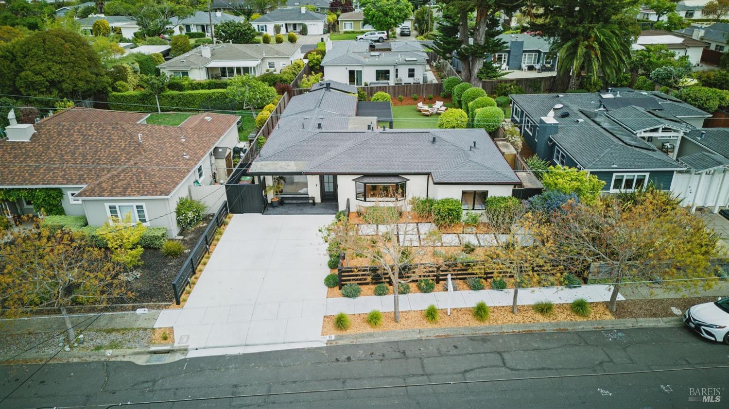 31 Mohawk Avenue Corte Madera, CA 94925 - Photo 52 of 57 a aerial view of a house with swimming pool and large trees