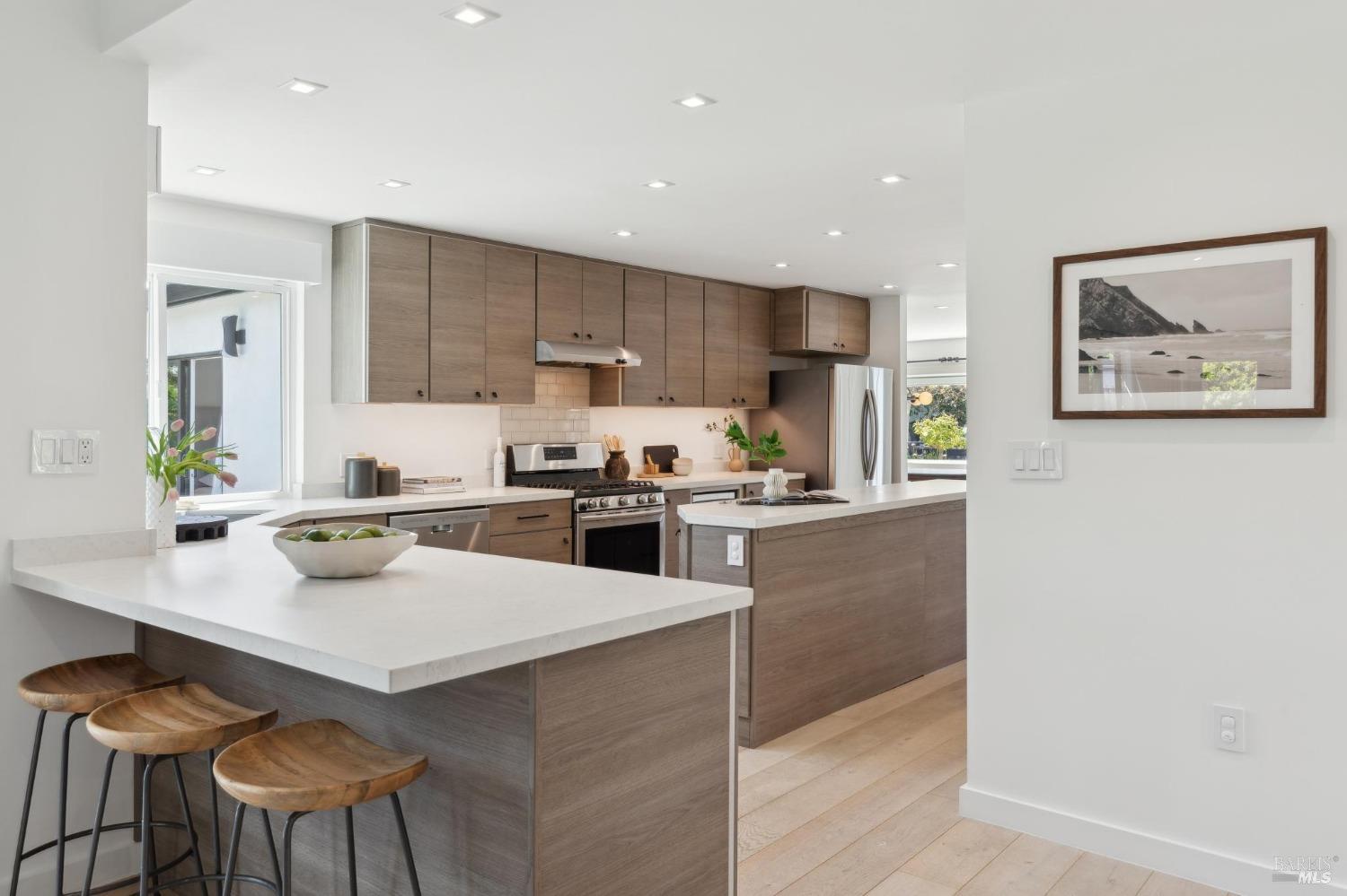 31 Mohawk Avenue Corte Madera, CA 94925 - Photo 10 of 57 a kitchen with a table and chairs in it