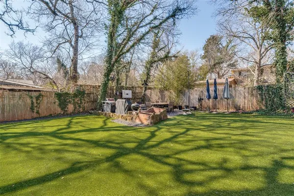 a view of a dinning table and chairs in the couches