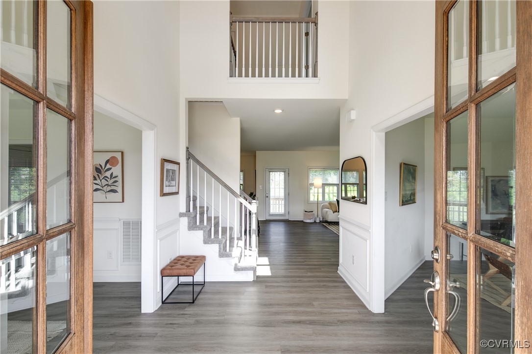 11506 Avening Road Midlothian, VA 23112 - Photo 11 of 50 a view of an entryway with wooden floor and windows