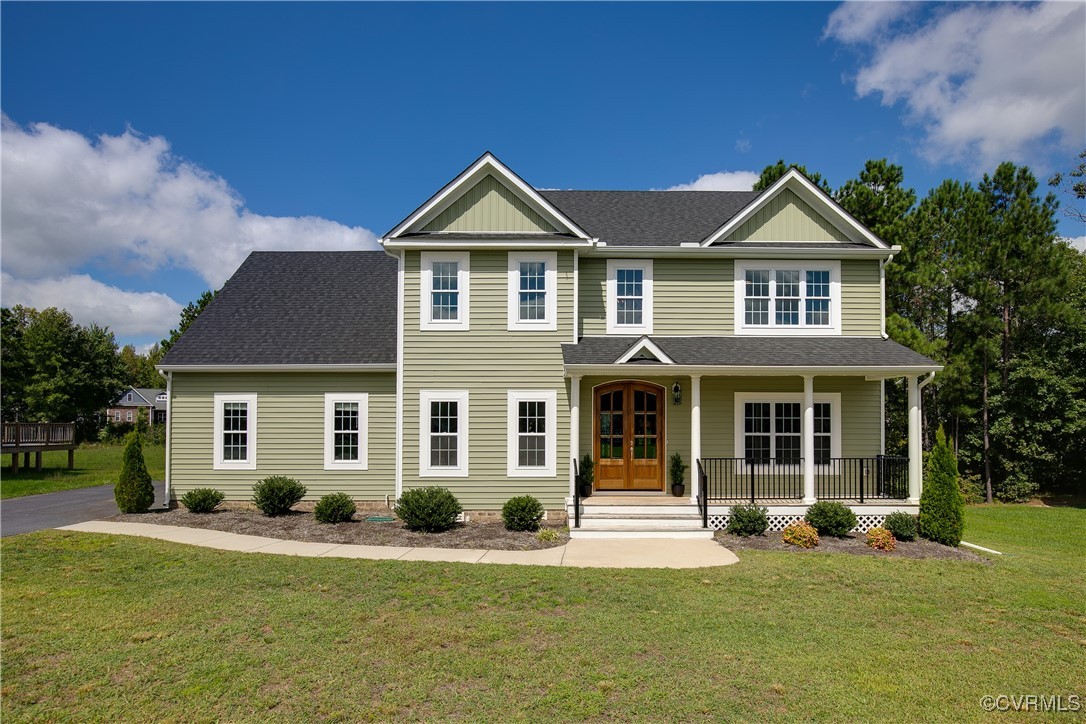 11506 Avening Road Midlothian, VA 23112 - Photo 2 of 50 a front view of a house with a yard