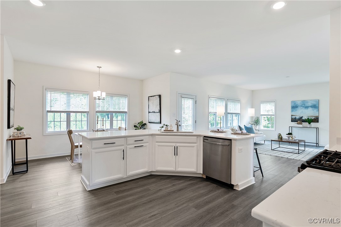 11506 Avening Road Midlothian, VA 23112 - Photo 22 of 50 a large white kitchen with stainless steel appliances granite countertop a stove a sink a refrigerator and white cabinets with wooden floor