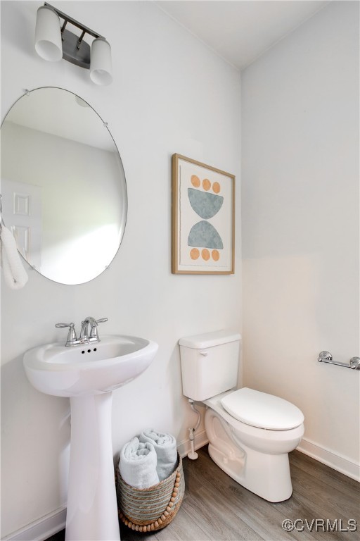 11506 Avening Road Midlothian, VA 23112 - Photo 25 of 50 a bathroom with a toilet a sink and mirror