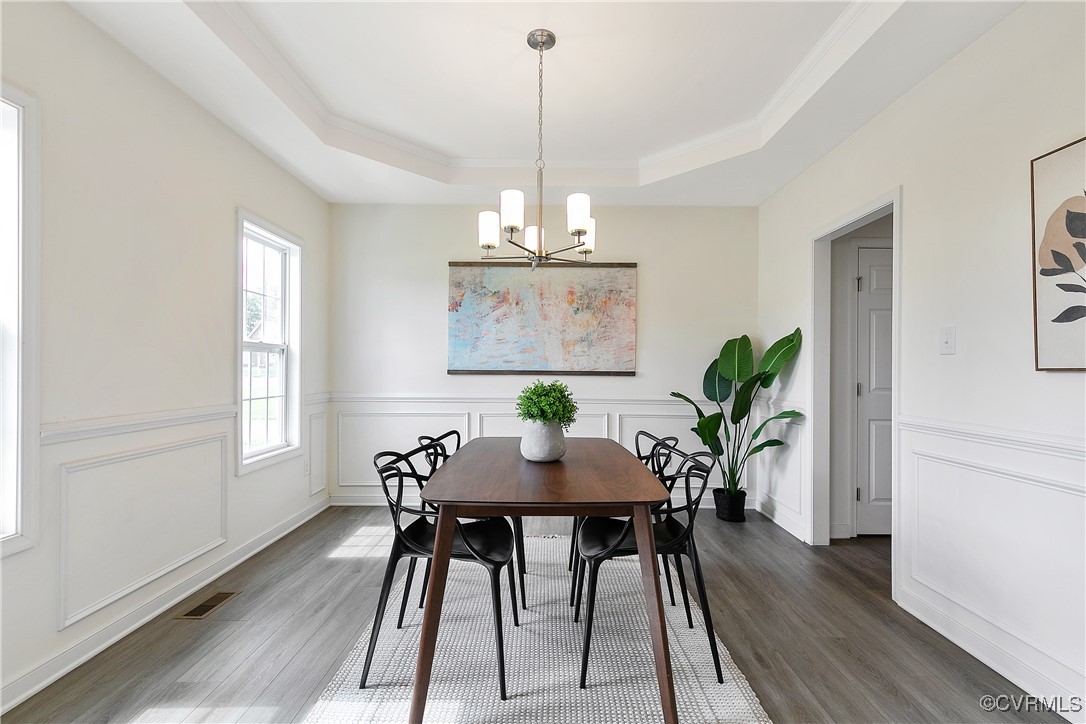 11506 Avening Road Midlothian, VA 23112 - Photo 26 of 50 a view of a dining room with furniture window and wooden floor