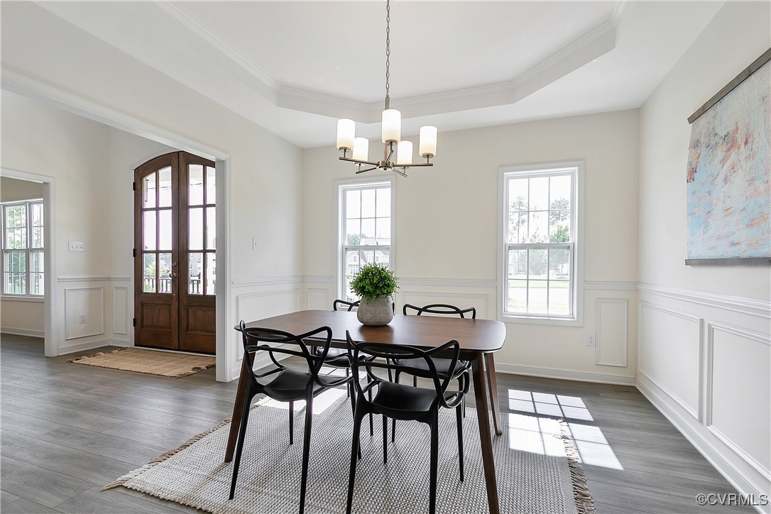 11506 Avening Road Midlothian, VA 23112 - Photo 27 of 50 a view of a dining room with furniture window and wooden floor